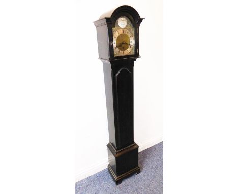 An ebonised cased grandmother clock of slim proportions; the 17cm broken-arch dial signed 'Tempus Fugit'&nbsp;and with silver