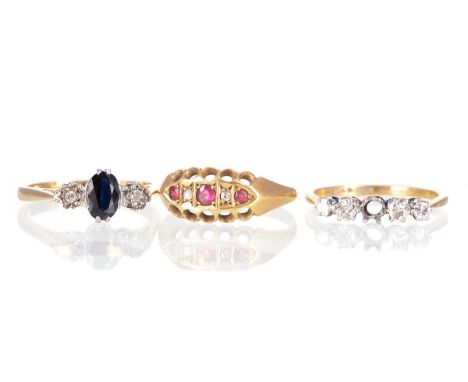 SAPPHIRE AND DIAMOND THREE STONE RING,along with another partial diamond ring and a ruby and diamond ring, each set in eighte