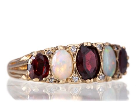 VICTORIAN GARNET, OPAL AND DIAMOND RING,set with alternating garnets and opals interspaced by diamond chips, in nine carat go