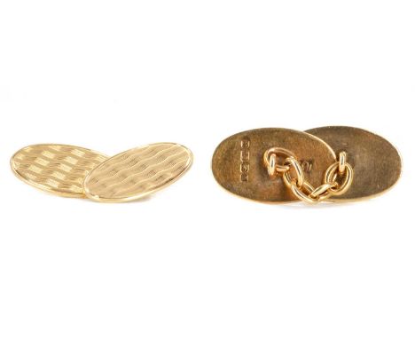 PAIR OF EIGHTEEN CARAT GOLD CUFFLINKS,with engine turned decoration to each panel, 10.3g