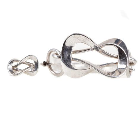 ITALIAN SILVER 'LOVERS KNOT' BRACELET AND RING,signed OP OrlandiniBoth worn, scratches and signs of wear visible to each.&nbs