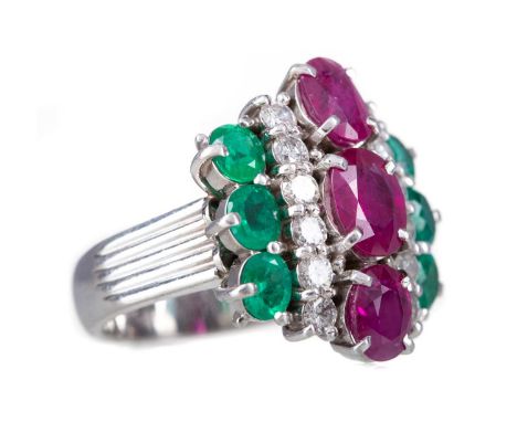 CERTIFICATED RUBY, DIAMOND AND EMERALD RING,set with a row of treated rubies, flanked by round brilliant cut diamonds totalli