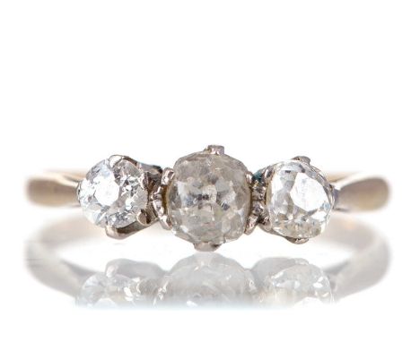VICTORIAN DIAMOND THREE STONE RING,set with a row of old mine cut stones totalling approximately 0.70 carats, marked 18CT, si