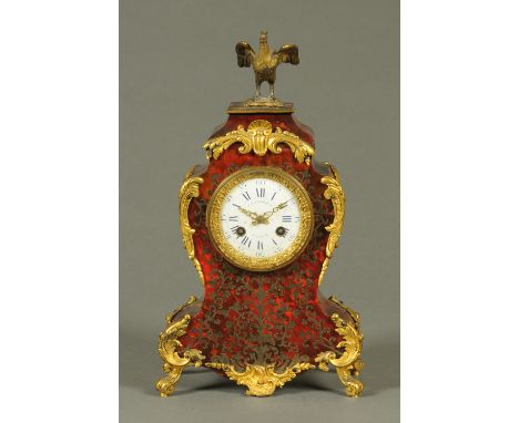 A 19th century boulle marquetry mantle clock, with two-train movement, the face marked "E. Villemsens, Paris".  Height 33 cm.