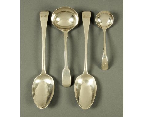 Two silver serving spoons, London 1817, a silver ladle, London 1856, and sauce ladle, 1957. 