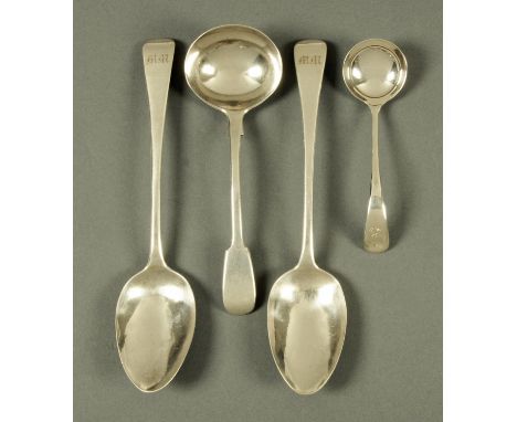 Two silver serving spoons, London 1817, a silver ladle, London 1856, and sauce ladle, 1957. 