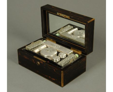 A Victorian coromandelwood vanity case, the silver topped accessories with London hallmark for 1869, with lift out tray, mirr