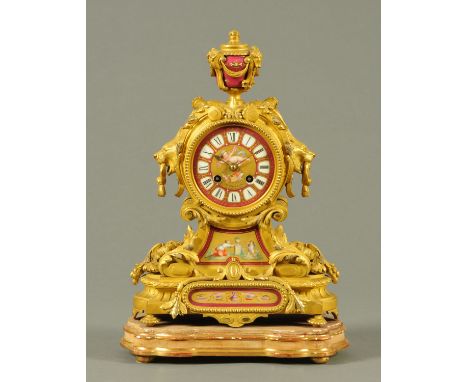 A 19th century French porcelain and ormolu clock, the ceramic dial marked "J. Muirhead & Sons, Glasgow & Paris" and with two-