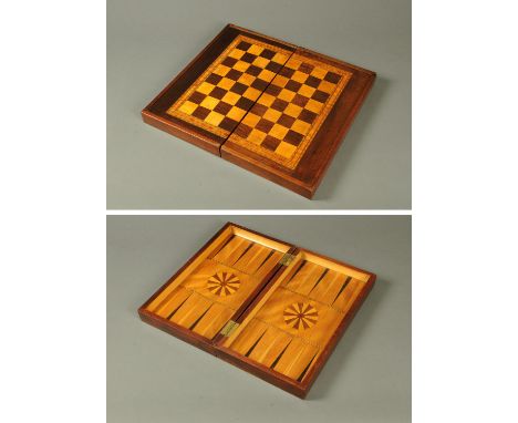 A 19th century combined chess and backgammon box, in a variety of specimen woods.  Width across front 46 cm, depth closed 26.