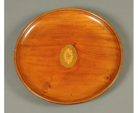 An Edwardian inlaid mahogany circular dish.  Diameter 30 cm.  CONDITION REPORT: This bowl is structurally in good order. Ther