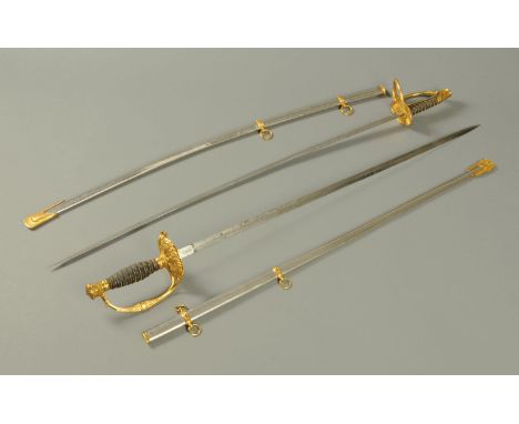 Two American presentation swords, the sabre stamped "Horstmann, Philadelphia" and verso "Germany" with foliate engraved blade