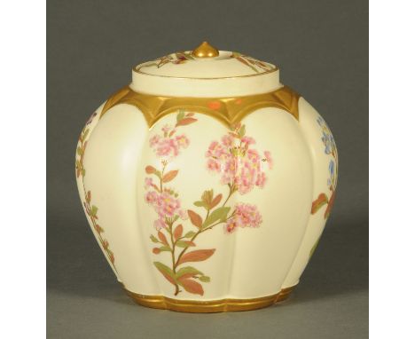 A royal Worcester lidded jar, cantaloupe form, with foliate decoration, puce mark to base.  Height 17 cm. 