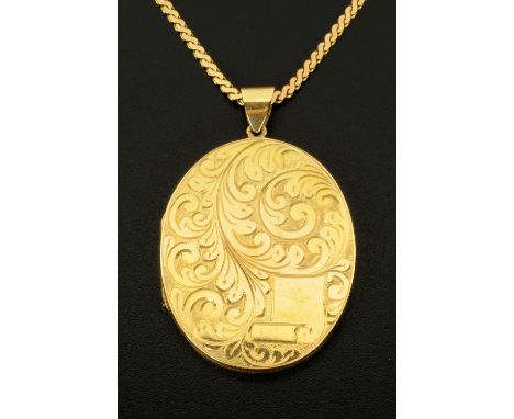 A 9 ct gold locket and chain, the serpentine chain length 56.2 cm, 10.1 grams, Birmingham 1977, the locket Birmingham 1965, 2