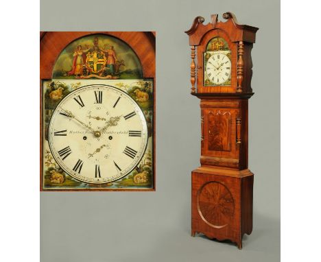 A Victorian mahogany longcase clock by Rutherford of Huddersfield, with swans neck pediment above the arched glazed door encl