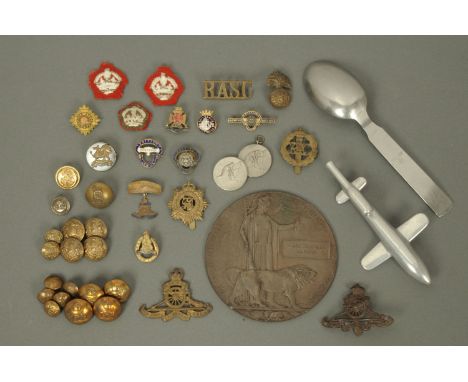 A First World War death penny, to "Carl Stanley Latham", an aluminium model of a doodlebug, collection of badges and buttons 