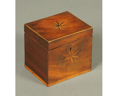 A George III mahogany single compartment tea caddy, with starburst top and front panels.  Width 11 cm. 