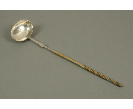 A George III silver toddy ladle, initialled "IEC", with makers mark "IL" over "IR" and with bone handle.  Length 36 cm. 