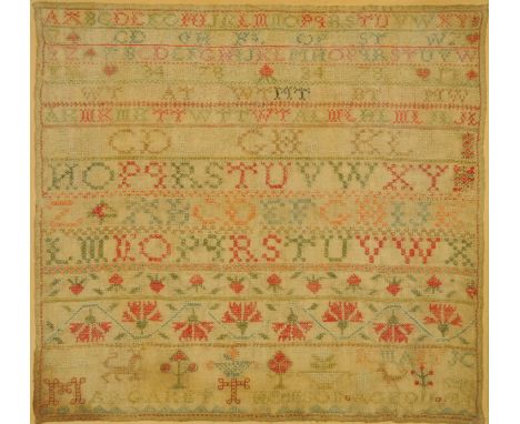 A 19th century sampler, Margaret Thomson.  43 cm x 46 cm.