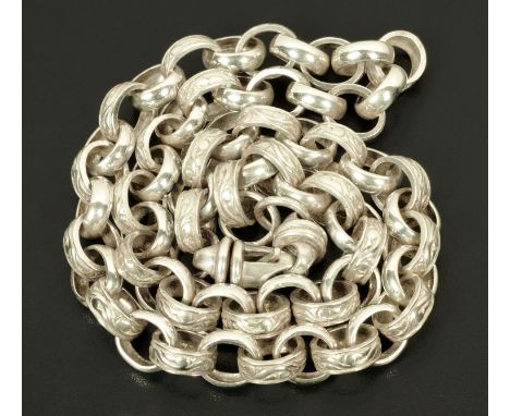 An engraved heavy white metal belcher neck chain.