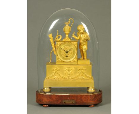 A 19th century French figural spelter mantle clock, housed under a glass dome, single-train.  Overall height 43 cm.