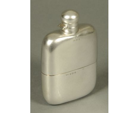 A Mappin & Webb large silver hip flask, Birmingham 1932, 322 grams.  Height 15.7 cm (see illustration). CONDITION REPORT: The