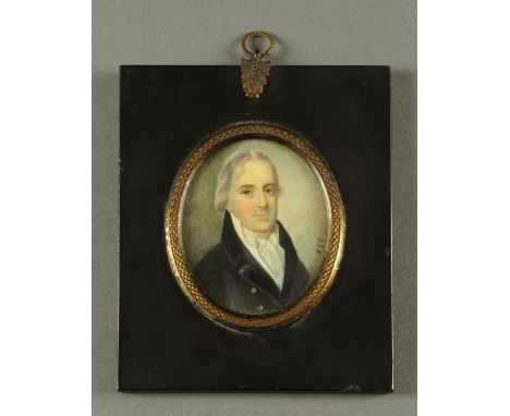 A portrait miniature, on ivory, Georgian gentleman initialled "DGE" and wearing a blue jacket and white cravat.  80 mm x 67 m