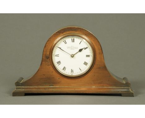 A Camerer Cuss & Co. Oxford Street copper cased mantle clock, with single-train movement and Roman numerals.  Case width 25 c