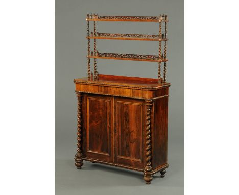 A Victorian rosewood chiffonier, with shelved superstructure, the base with frieze drawer above a pair of panelled cupboard d