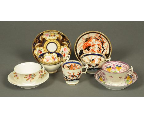 A 19th century London shaped trio, possibly Newhall, in the Imari pattern, two lustre London shaped tea cups and saucers and 