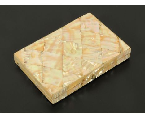 A Victorian mother of pearl card case, with a series of interior divisions.  10.8 cm x 7.6 cm.  CONDITION REPORT: The clasp c