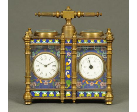 A brass desk timepiece and barometer, with Champleve type enamel decoration.  Width 128 mm. 