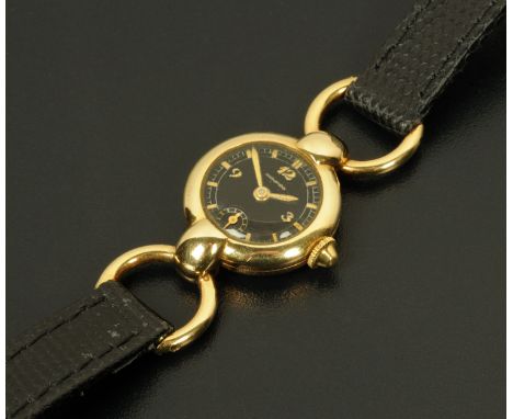 A ladies 14 ct gold Movado manual wind wristwatch, circa 1965. 