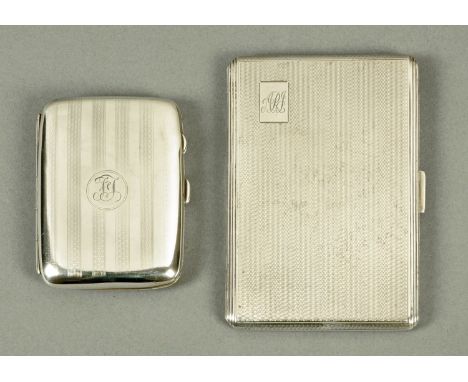 Two silver cigarette cases, both engine turned, largest Birmingham 1955, smaller Birmingham 1917, combined weight 293 grams.