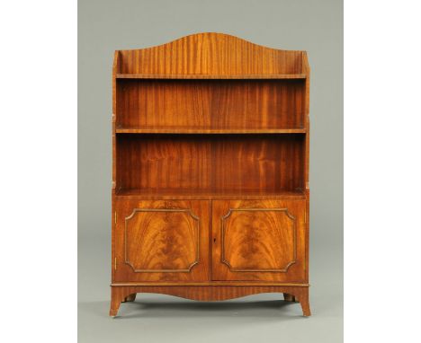 A Bevan Funnell mahogany bookcase, with cupboard beneath.  Width 83.5 cm.  CONDITION REPORT: Generally very good order with n