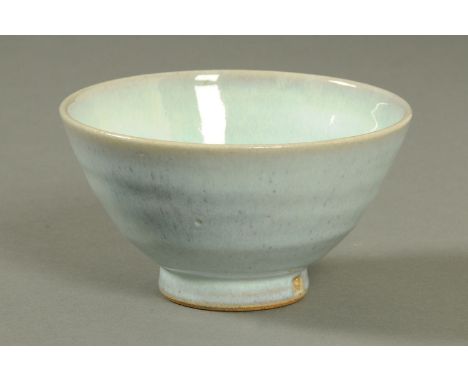 Edward Hughes (1953-2006), a Claire de Lune glazed bowl, light blue flecked, impressed "EH" monogram.  Diameter 14.5 cm (see 