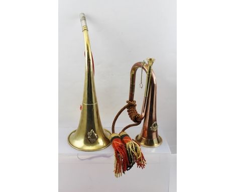 A BRASS HUNTING HORN with applied "Wild Boar" decoration, together with a BUGLE 