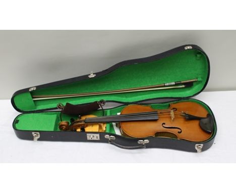 A FULL SIZE VIOLIN having golden colour varnish and two piece back measuring 14", bears interior label "Copy of Antonius Stra