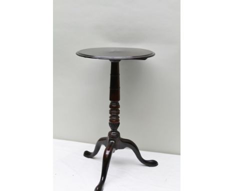 A 19TH CENTURY MAHOGANY WINE TABLE, raised on turned stem with tripod supports, top 39.5cm diameter 