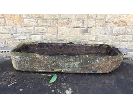 A VINTAGE HEAVY STONE WATER TROUGH with curved front corners, 140cm x 47cm x 23cm 