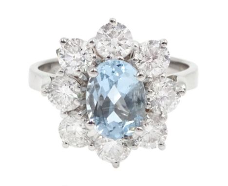 18ct white gold oval aquamarine and round brilliant cut diamond cluster ring, hallmarked, aquamarine 1.30 carat, total diamon