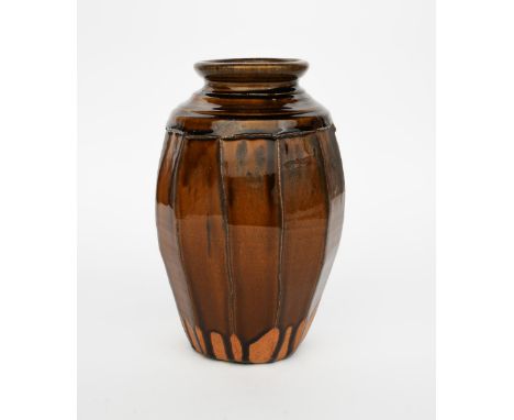 Richard Batterham (1936-2021) a cut-sided stoneware Lily vase covered in a running manganese glaze, unsigned, 34cm. high Prov