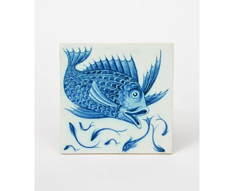 An early William De Morgan tile, painted in blue with a large scaly fish swimming in a shoal of smaller fish unsigned, 15.5 x
