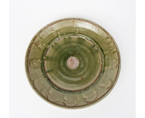 Richard Batterham (born 1936-2021) a large stoneware fruit dish, covered with an ash glaze, the well unglazed with prop unsig