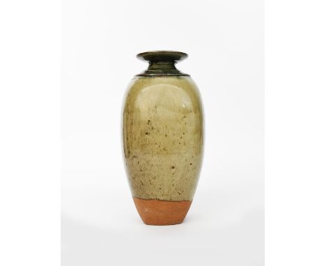 Richard Batterham (1936-2021) a stoneware medium bottle, beaten, covered to the foot with an ash glaze, unsigned, 43cm. high 