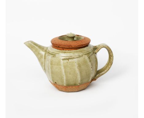 Richard Batterham (1936-2021) a small cut-sided stoneware teapot and cover, partially covered with an ash glaze painted cobal