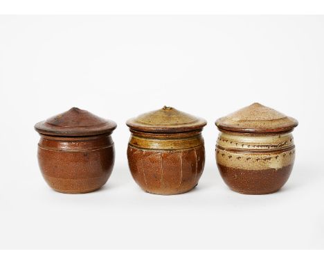 Richard Batterham (1936-2021) a cut-sided stoneware mustard pot and cover, another salt-glazed mustard pot and cover with cha