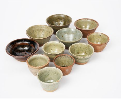Richard Batterham (1936-2021) eleven small clay test bowls, glazed in ash and black iron, unsigned, incised H clay numbers, c