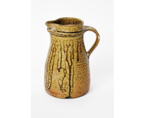 Richard Batterham (1936-2021) an early stoneware jug, covered in a running ash glaze impressed seal mark,  handle repaired 21