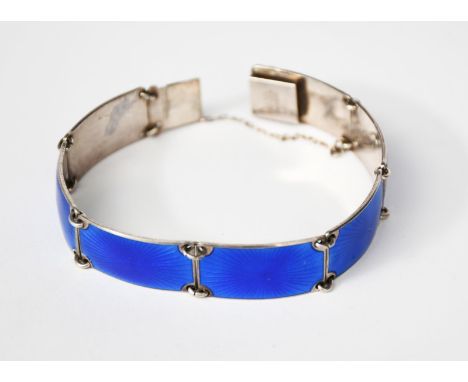 A Norwegian Finn Jensen silver and enamel bracelet, seven rectangular panels, enamelled blue, stamped Norway Sterling 925, 18