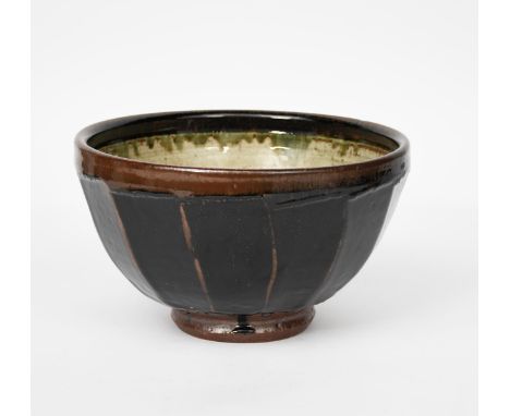 Richard Batterham (born 1936-2021) a large cut-sided stoneware bowl, the exterior glazed black iron, the interior ash unsigne